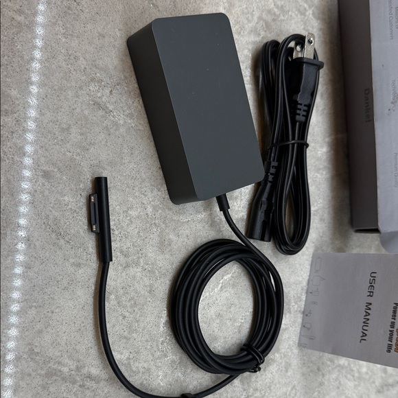 Surface Pro Black Power Adapter with Cable box and manual. New opened box. - Picture 3 of 5